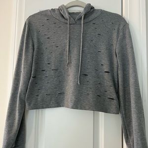 Cropped ripped sweatshirt